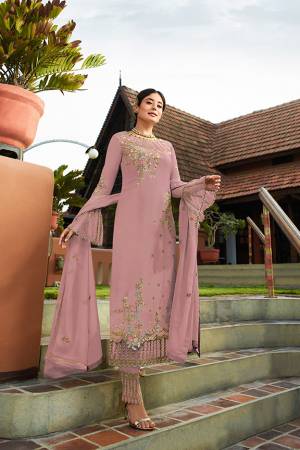 Grab This Very Beautiful Heavy Designer Straight Cut Suit In Pink Color. Its Pretty Embroidered Top And Dupatta Are Fabricated On Georgette Paired With Embroidered Santoon Fabricated Bottom. Buy This Lovely Suit Now.