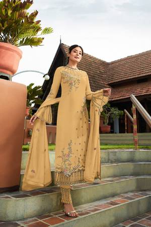 Grab This Very Beautiful Heavy Designer Straight Cut Suit In Yellow Color. Its Pretty Embroidered Top And Dupatta Are Fabricated On Georgette Paired With Embroidered Santoon Fabricated Bottom. Buy This Lovely Suit Now.