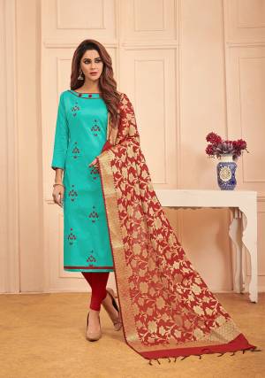 Look Beautiful In This Deigner Straight Suit In Turquoise Blue Color Paired With Contrasting Red Colored Bottom And Dupatta. Its Top And Bottom Are Cotton Based Paired With Banarasi Silk Weaved Dupatta. Buy This Dress material And Get This Stitched As Per Your Desired Fit And Comfort. 