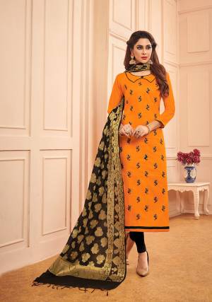If Those Readymade Suit Does Not Lend You The Desired Comfort Than Grab This Designer Dress Material In Orange Color Paired With Black Colored Bottom And Dupatta. This Pretty Dress Material Is Cotton Based Paired With Banarasi Silk Fabricated Dupatta. 