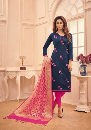 Add This Pretty Dress Material To Your Wardrobe In Navy Blue Colored Top Paired With Contrasting Rani Pink Colored Bottom And Dupatta. Its Top And Bottom Are Fabricated On Cotton Paired With Banarasi Silk Dupatta. Buy Now.
