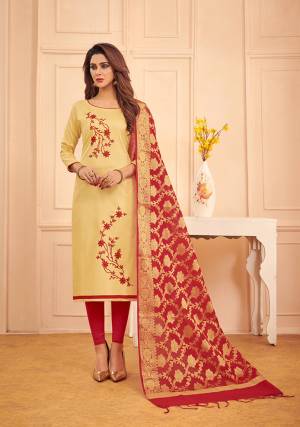 Add This Pretty Dress Material To Your Wardrobe In Cream Colored Top Paired With Contrasting Red Colored Bottom And Dupatta. Its Top And Bottom Are Fabricated On Cotton Paired With Banarasi Silk Dupatta. Buy Now.
