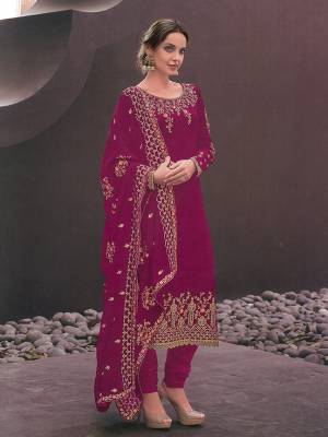 Shine Bright In This Heavy Designer Straight Cut Suit In Magenta Pink Color. This Pretty Heavy Embroidered Top And Dupatta Are Fabricated on Georgette Paired With Santoon Bottom Fabricated Bottom. Buy This Suit Now.