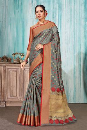 Celebrate This Festive Season With Beauty And Comfort In This Silk Based Grey Colored Saree Paired With Red Colored Blouse. This Saree Is Fabricated On Art Silk Paired With Jacquard Silk Fabricated Blouse. Buy Now.