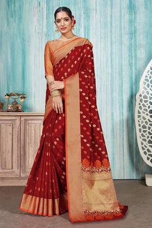 Celebrate This Festive Season With Beauty And Comfort In This Silk Based Maroon Colored Saree Paired With Red Colored Blouse. This Saree Is Fabricated On Art Silk Paired With Jacquard Silk Fabricated Blouse. Buy Now.