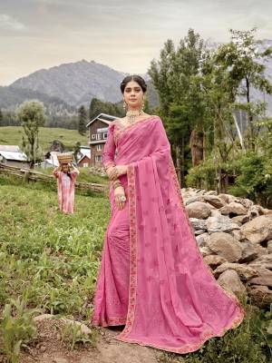 Look Pretty In This Designer Heavy Embroidered pink Colored Saree. This Saree Is Fabricated On Georgette Paired With Art Silk Fabricated Blouse. Both Its Fabric Are Light Weight And Ensures Superb Comfort All Day Long. 