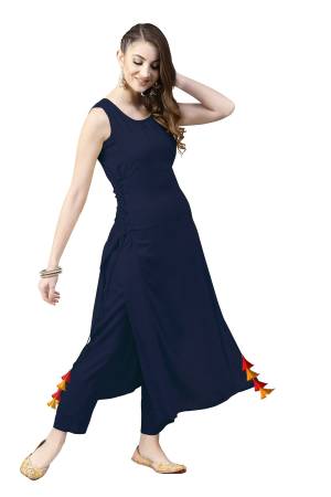 Grab This Pretty Readymade Designer Kurti In Navy Blue Color Fabricated On Rayon. It Has Very Pretty Side Pattern With Tassels. Buy This Lovely Kurti Now.
