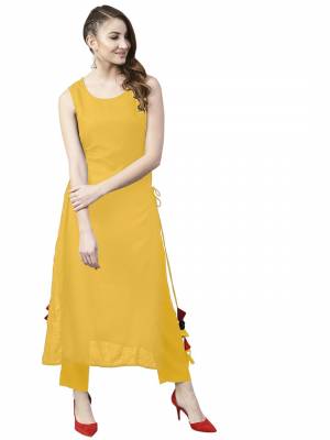 Grab This Pretty Readymade Designer Kurti In Yellow Color Fabricated On Rayon. It Has Very Pretty Side Pattern With Tassels. Buy This Lovely Kurti Now.