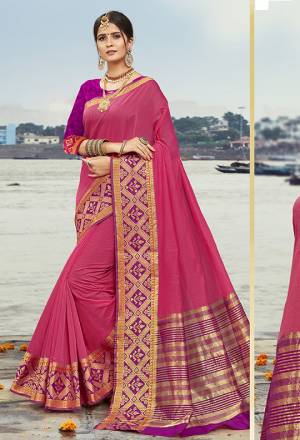 Add This Beautiful Saree To Your Wardrobe In Pink Color Paired With Contrasting Purple Colored Blouse. This Saree Is Cotton Silk Based Paired With art Silk Fabricated Blouse. Buy Now.