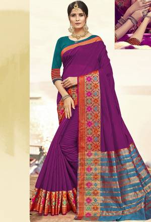 Bright And Visually Appealing Color Is Here With This Designer Saree In Purple Color Paired With Contrasting Teal Blue Colored Blouse. This Saree Is Cotton Silk Based Paired With Art Silk Fabricated Blouse. Its Fabric Gives A Rich Look To Your Personality. 