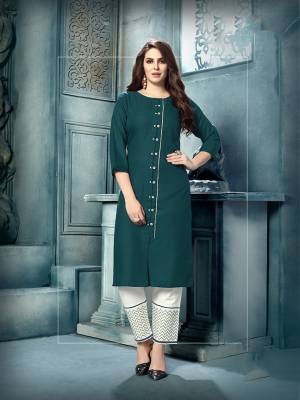 New Shade Is Here To Add Into Your Wardrobe With This Designer Readymade Kurti In Teal Blue Color Paired With White Colored Readymade Pant. This Lovely Pair Is Fabricated On Cotton And Available In All Regular Sizes. 