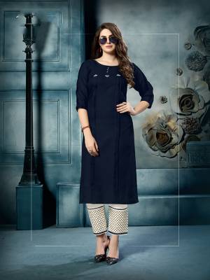 Enhance Your Persoanlity Wearing This Designer Readymade Pair Of Kurti And Pant In Navy Blue And White Color Respectively. This Kurti And Pant Are Fabricated On Cotton Which Is Light Weight And Ensures Superb Comfort All Day Long. 
