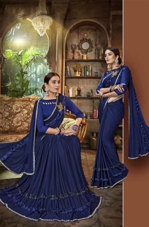 Bright And Appealing Color Is Here With This Designer Saree In Royal Blue Color Paired With Royal Blue Colored Blouse. This Pretty Saree Is Lycra Based Paired With Art Silk Fabricated Blouse. It Is Light In Weight And Easy To Carry All Day Long. 