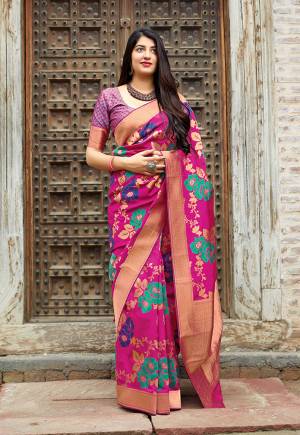 Grab This Designer Silk Based Bright Colored Saree In Dark Pink Color Paired With Dark Pink Colored Blouse. This Saree And Blouse Are Fabricated On Banarasi Art Silk Beautified With Weave All Over. 