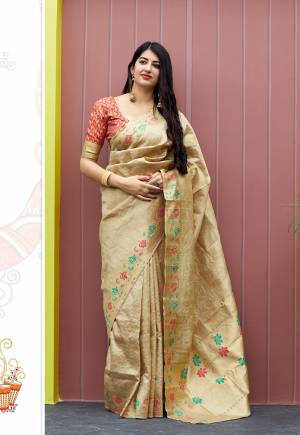 Proper Traditional Looking Designer Silk Based Saree Is Here In Cream Color Paired With Contrasting Red Colored Blouse. This Saree And Blouse Are Fabricated On Banarasi Art Silk. Buy Now.