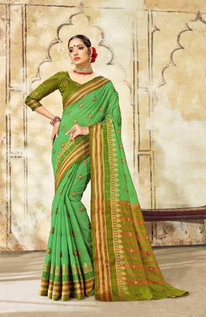 Grab This Very Beautiful Designer Saree With A Royal Silk Touch In Light Gren Color Paired With Green Colored Blouse. This Saree Is Fabricated On Cotton Silk Paired With Art Silk Fabricated Blouse. It Has Very Elegant Heavy Weaved Border. 