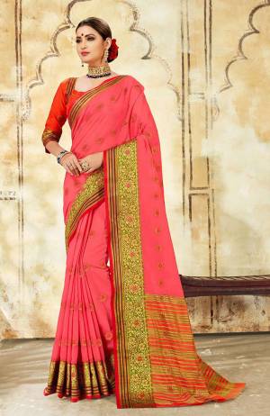 Celebrate This Festive Season With Ease And Comfort Wearing This Royal Looking Silk Based Saree In Pink Color Paired With Red Colored Blouse. This Saree Is Cotton Silk Based Paired With Art Silk Fabricated Blouse. Buy Now.