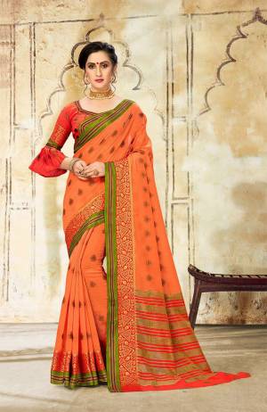 Grab This Very Beautiful Designer Saree With A Royal Silk Touch In Light Orange Color Paired With Orange Colored Blouse. This Saree Is Fabricated On Cotton Silk Paired With Art Silk Fabricated Blouse. It Has Very Elegant Heavy Weaved Border. 