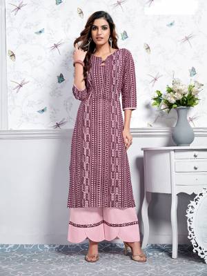This Festive Season, Celebrate With Beauty And Comfort Wearing This Designer Pair Of Kurti And Plazzo In Purple And Pink Color. This Readymade Pair Is Fabricated On Cotton Which Ensures Superb Comfort All Day Long. 