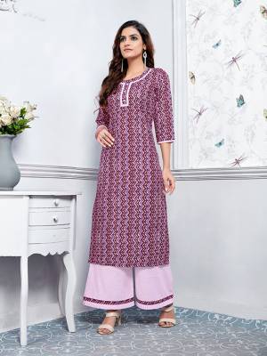 Enhance Your Personality Wearing This Readymade Pair Of Kurti And Plazzo In Purple And Lilac Color. This Kurti And Plazzo Are Fabricated On Cotton Beautified With Prints. Buy Now.