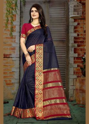 Look festival ready and perfect In that traditional look Wearing this beautiful Navy Blue Colored checkered saree. Adorn with stylish jhumkis to complete the look.?
