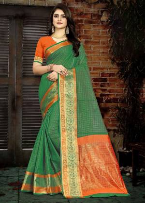 Look festival ready and perfect In that traditional look Wearing this beautiful Green Colored checkered saree. Adorn with stylish jhumkis to complete the look.?