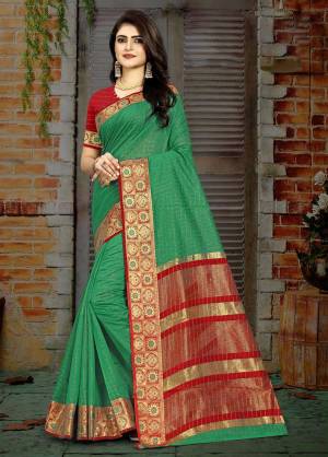 Look festival ready and perfect In that traditional look Wearing this beautiful Green Colored checkered saree. Adorn with stylish jhumkis to complete the look.?