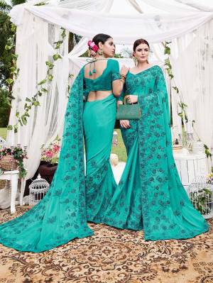 You Will Definitely Earn Lots Of Compliments Wearing This Designer Silk Georgette Based Saree In Turquoise Blue Color. It Is Beautified With Heavy Embroidery Paired With Art Silk fabricated Blouse. 