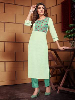 Here Is A Designer Readymade Kurti With Bottom For Your Semi-Casuals Or Festive Wear In Pretty Shades Of Green. Its Thread Embroidered Kurti Is Fabricated Linen Paired With Cotton Slub Fabricated Bottom.