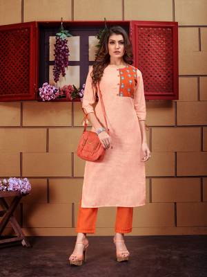 Celebrate This Festive Season Wearing This Readymade Designer Pair Of Kurti With Pants In Shades Of Orange. It Is Fabricated On Linen Paired With Cotton Slub Fabricated Bottom. 