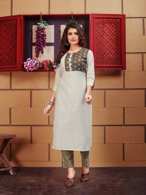 Look Pretty In This Designer Readymade Pair Of Kurti And Bottom In Shades Of Grey. Its Kurti Is Linen Based Paired With Cotton Slub Fabricated Bottom. 