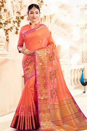 Celebrate This Festive Season With Beauty And Comfort Wearing This Designer Silk Based Saree In Dark Peach Color Paired With Dark Peach Colored Blouse. This Saree And Blouse Are Beautified With Weave Giving It An Attractive Look.