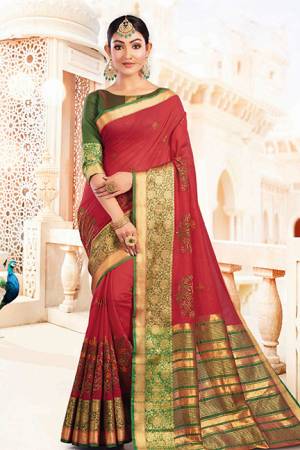 Celebrate This Festive Season With Beauty And Comfort Wearing This Designer Silk Based Saree In Red Color Paired With Contrasting Green Colored Blouse. This Saree And Blouse Are Beautified With Weave Giving It An Attractive Look.