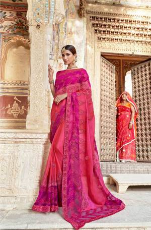 Shine Bright Wearing This Heavy Designer Saree In Rani Pink Color. This Pretty Heavy Embroidered Saree Is Silk Georgette Based Paired With Art Silk Fabricated Blouse. 