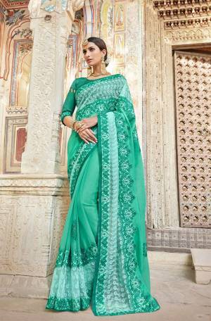 Shine Bright Wearing This Heavy Designer Saree In Sea Green Color. This Pretty Heavy Embroidered Saree Is Chiffon Georgette Based Paired With Art Silk Fabricated Blouse. 