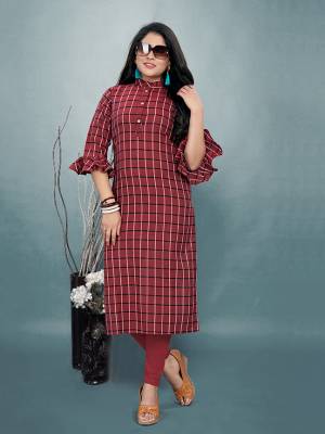 For Your Casual Or Semi-Casual Wear, Grab This Readymade Kurti In Maroon Color Fabricated On Cotton. It Is Beautified With Checks Prints All Over With An Attractive Frill Pattern Sleeve. Pair This Up Same Or Black Colored Leggings, Plazzo Or Pants. Buy Now.