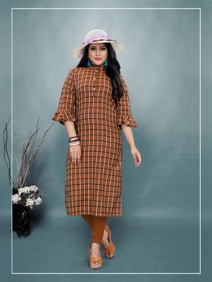 For Your Casual Or Semi-Casual Wear, Grab This Readymade Kurti In Brown Color Fabricated On Cotton. It Is Beautified With Checks Prints All Over With An Attractive Frill Pattern Sleeve. Pair This Up Same Or Black Colored Leggings, Plazzo Or Pants. Buy Now.