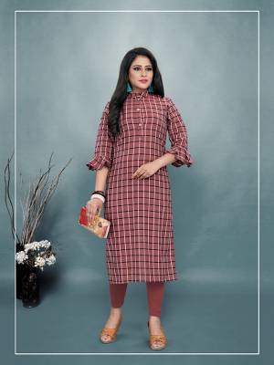 For Your Casual Or Semi-Casual Wear, Grab This Readymade Kurti In Dusty Pink Color Fabricated On Cotton. It Is Beautified With Checks Prints All Over With An Attractive Frill Pattern Sleeve. Pair This Up Same Or Black Colored Leggings, Plazzo Or Pants. Buy Now.
