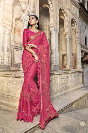 You Will Definitely Earn Lots Of Compliments Wearing This Attractive Looking Designer Saree In Pink Color. This Beautiful Saree Is Fabricated On Lycra Paired With Art Silk Fabricated Blouse. Buy This Beautiful Saree Now.