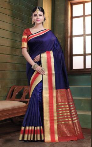 Flaunt Your Rich And Elegant Taste In This Simple Saree In Navy Blue Color Paired With Red Colored Blouse. This Saree And Blouse Are Fabricated On Art Silk Whih Gives A Rich Look To Your Personality. 