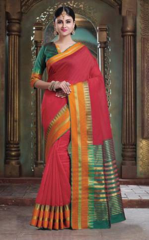 Flaunt Your Rich And Elegant Taste In This Simple Saree In Red Color Paired With Pine Green Colored Blouse. This Saree And Blouse Are Fabricated On Art Silk Whih Gives A Rich Look To Your Personality. 