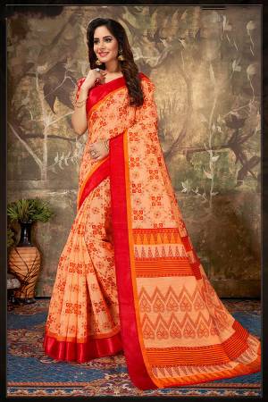 Add This Simple Saree To Your Wardrobe For Your Casual Or Semi-Casual Wear In Light Orange Color Paired With Orange Colored Blouse. This Saree Is Fabricated On Cotton Paired With Cotton Silk Fabricated Blouse. Buy Now.