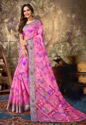 Here Is A Very Pretty Floral Printed Saree In Pink Color Paired With Mauve Colored Blouse. This Saree Is Cotton Based Paired With Cotton Silk Fabricated Blouse. It Is Light In Weigh And Easy To Drape, Which Is Easy To Carry All Day Long. 