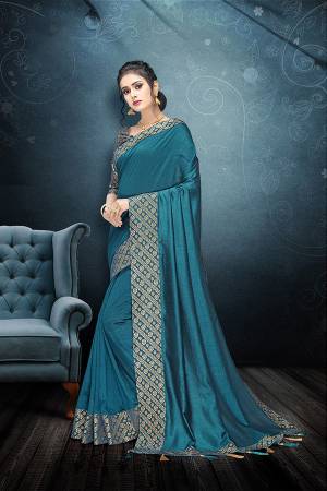 Flaunt Your Rich And Elegant Taste In This Plain Saree In Blue Color Paired With Blue Colored Blouse. This Silk Based Saree And Rich Color Pallete Will Earn You Lots Of Compliments From Onlookers.