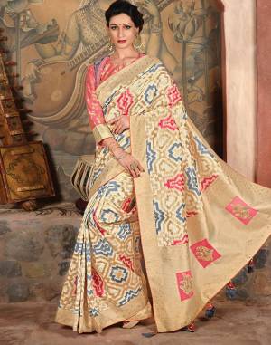 Make a poised statement in this summery and outstanding silk weaved saree is fresh hues and subtle details. Pair with heirloom jewels for that queenly appeal.