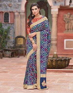 This royal blue weaved silk saree is a definition of style , culture and heritage. Pair it with the frilly embroidered jacket along with the blouse to take your classic game a notch higher. 