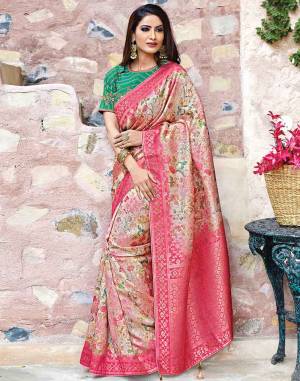 This silk saree is all about its poetic composition with ornate floral prints, flourishing colors and immaculate details that sing the tunes of festivities.  