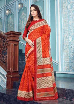 Look Pretty In This Lovely Floral Printed Saree In Orange Color Paired With Red Colored Blouse. This Saree Is Fabricated On Super Net Paired With Red Colored Blouse. It Is Light In Weight And Easy To Carry All Day Long. 