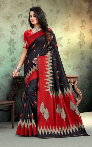 Flaunt Your Rich And Elegant Taste In This Simple Saree In Black Color Paired With Red Colored Blouse. This Saree And Blouse Are Fabricated On Art Silk Whih Gives A Rich Look To Your Personality