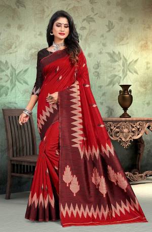 Flaunt Your Rich And Elegant Taste In This Simple Saree In Red Color Paired With Black Colored Blouse. This Saree And Blouse Are Fabricated On Art Silk Whih Gives A Rich Look To Your Personality
